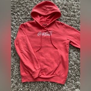 Women’s Coco Cola sweatshirt. Size: S Color: Red/Orange